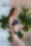 Nude girls looking over side